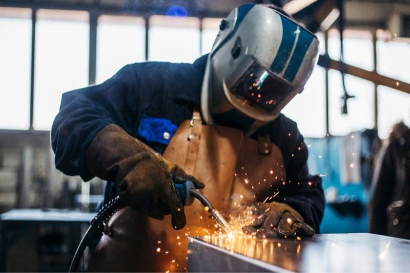 An image of a construction worker doing welding